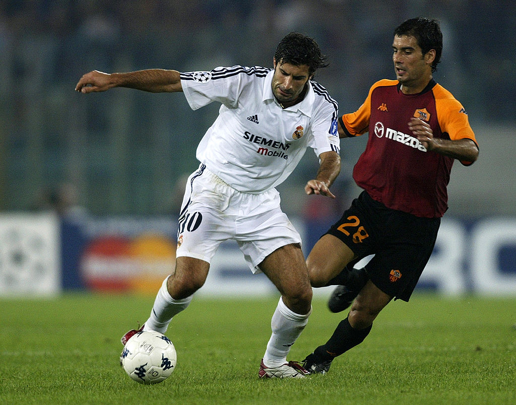 Luis Figo e Pep Guardiola in azione durante Roma-Real Madrid