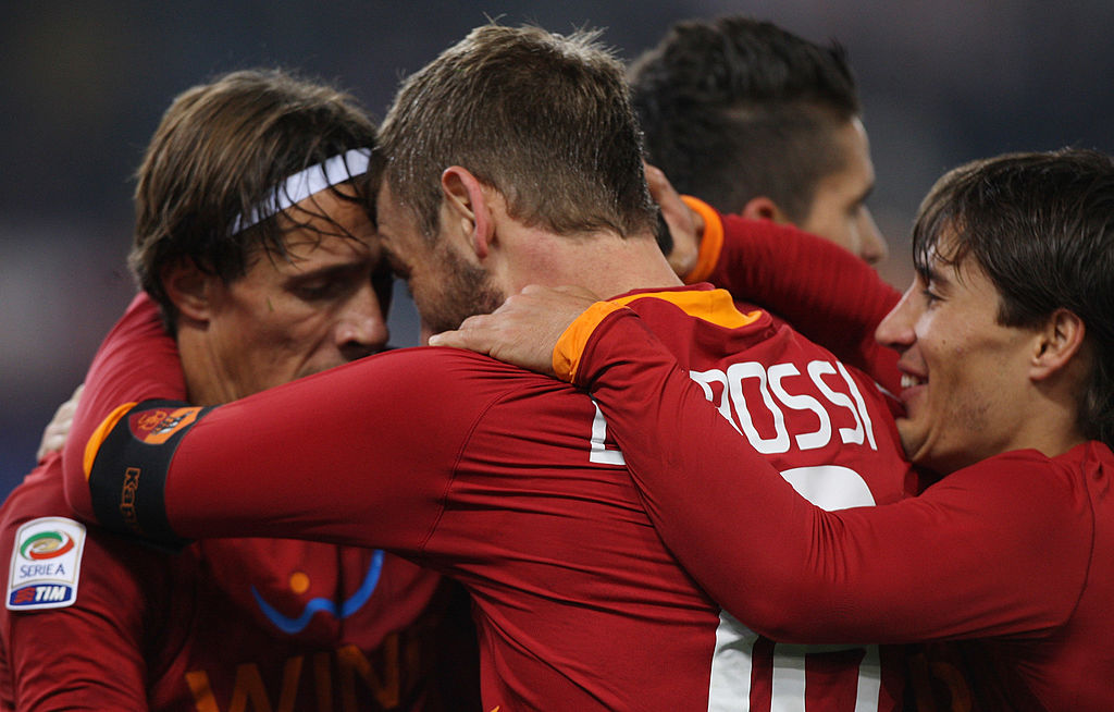 L'esultanza di De Rossi, Taddei e Bojan dopo uno dei due gol romanisti